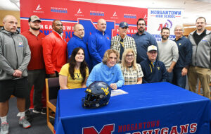 Morgantown football specialist Aidan Stire inks name to join Mountaineers; two others secure collegiate future